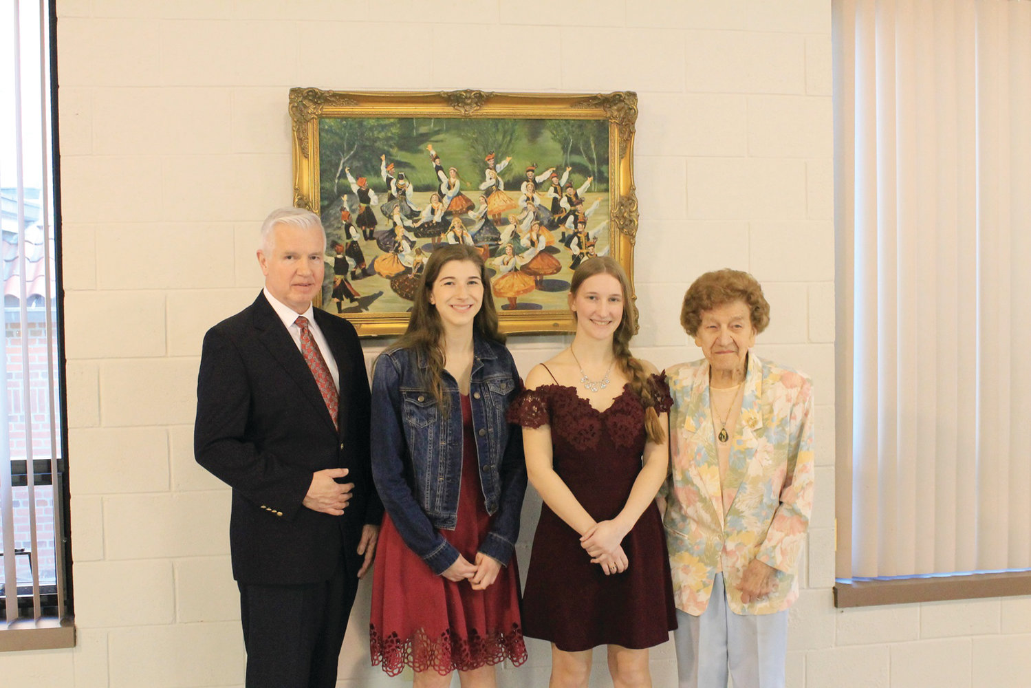 Pictured left to right are Foundation President Gregory Malec, scholarship recipients Vanessa A. Szulc and Klaudia Gajda, and Dr. Dorothy Pieniadz.